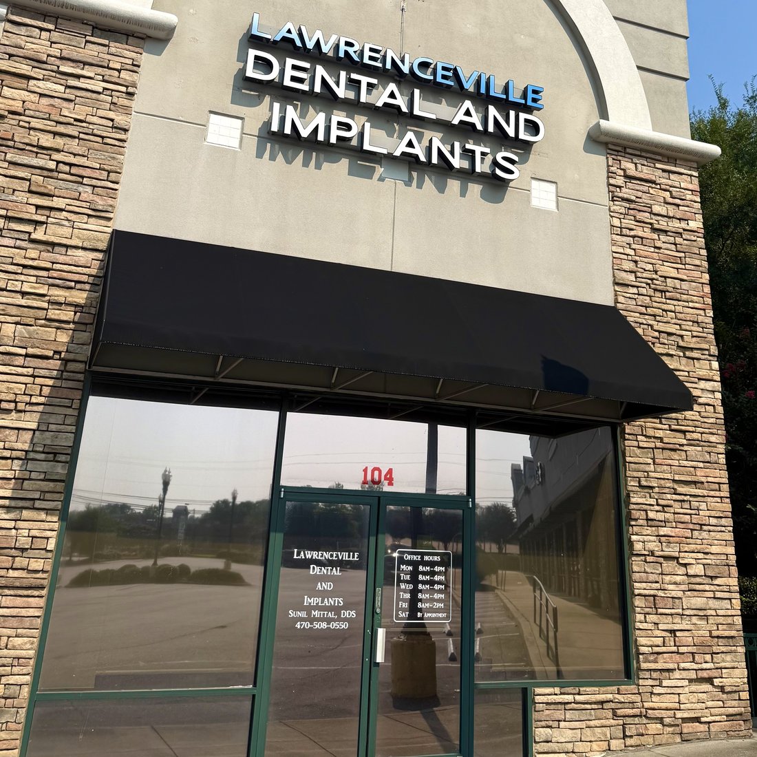 Exterior of Lawrenceville Dental and Implants office at 2003 Riverside Pkwy Ste 104, Lawrenceville, GA